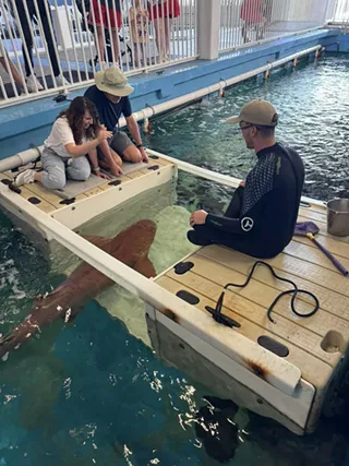 Chrissy Cook, Tim Klink of Indiana at Shark Experience at Clearwater Marine Aquarium.
