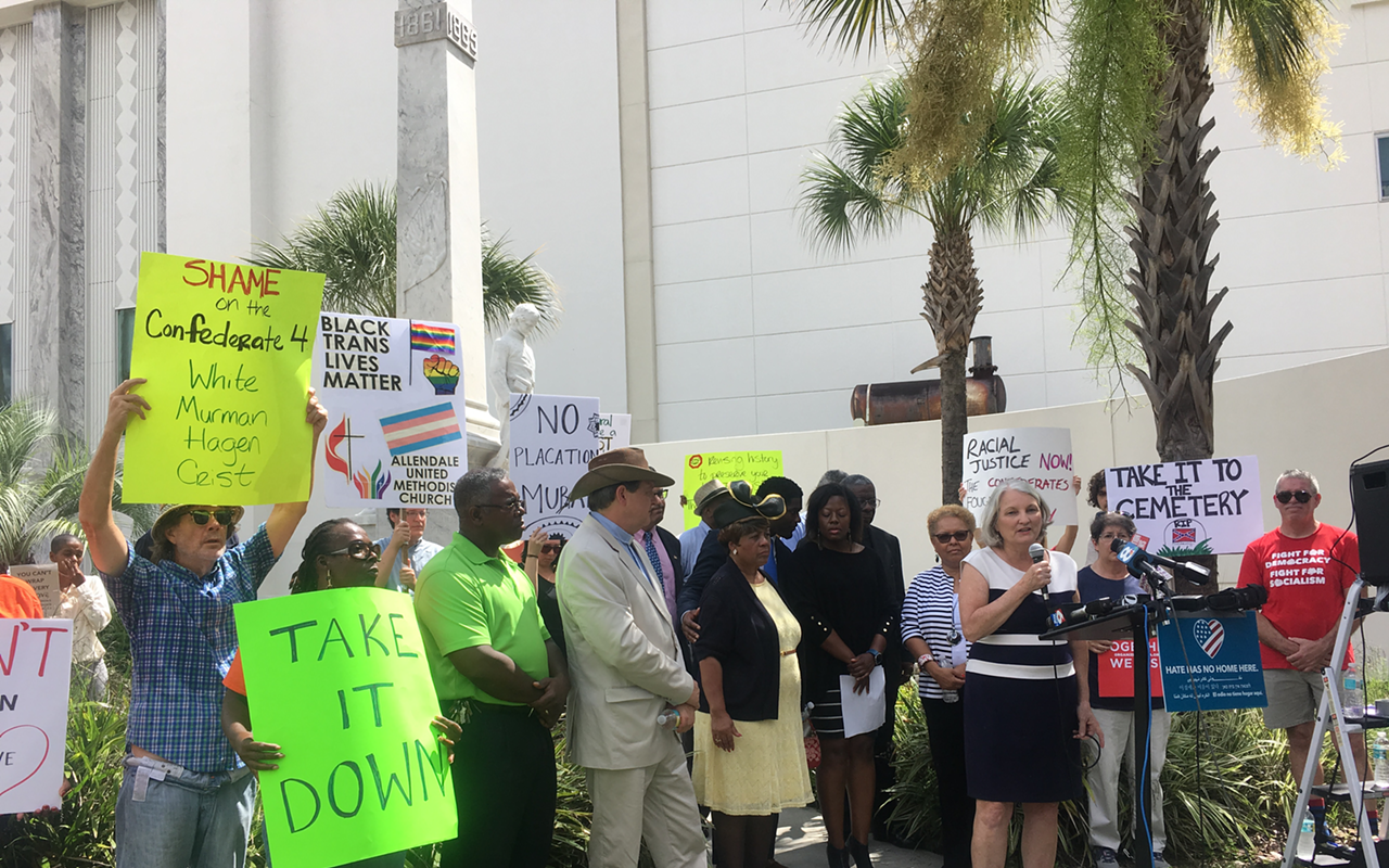 SPEAKING OUT: County Commissioner Pat Kemp at a rally calling for the statue’s removal.