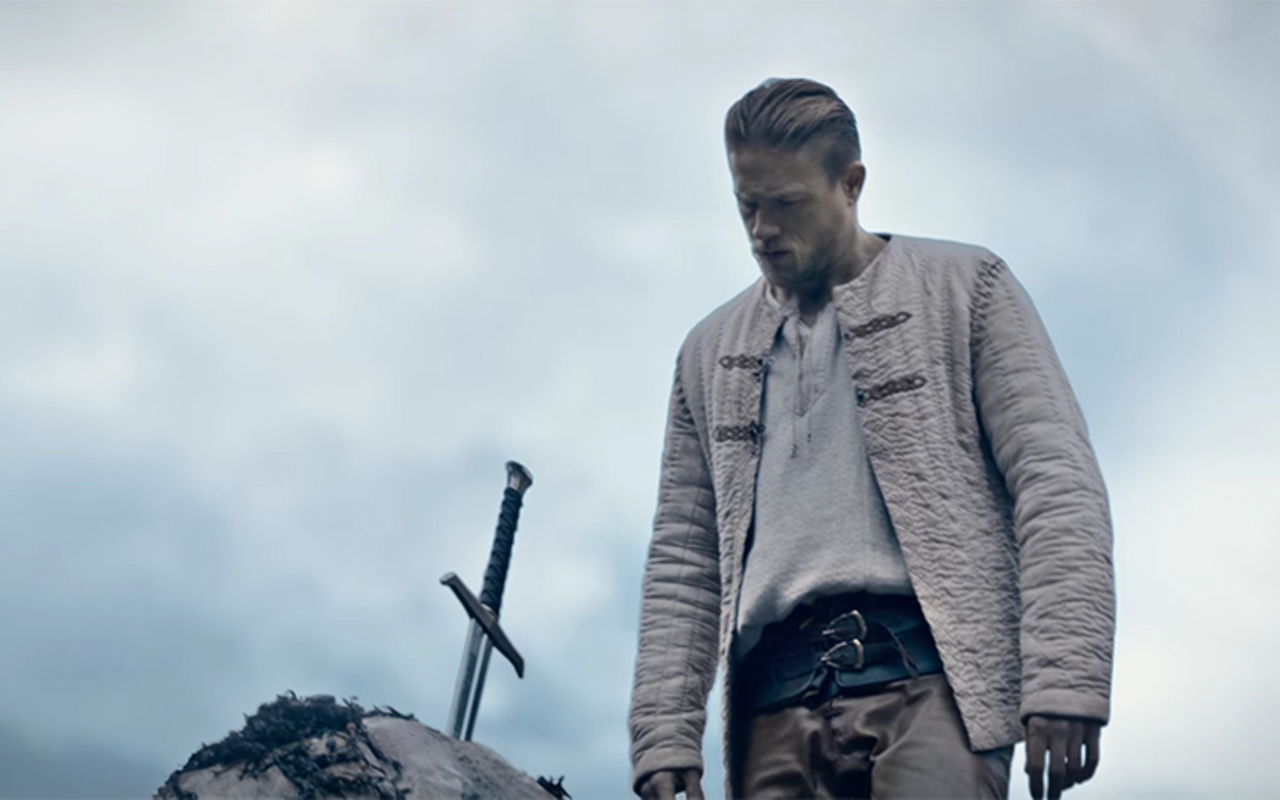 Charlie Hunnam sizes up Excalibur in Guy Ritchie's King Arthur: Legend of the Sword