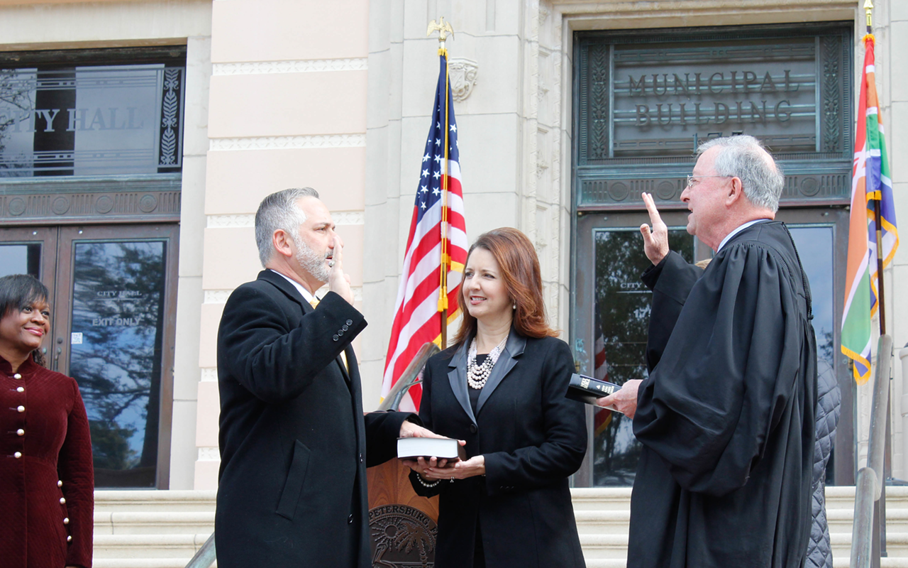 For the second time as mayor, recently-reelected Rick Kriseman takes the oath of office on the steps of St. Pete City Hall next to his wife, Kerry Kriseman.