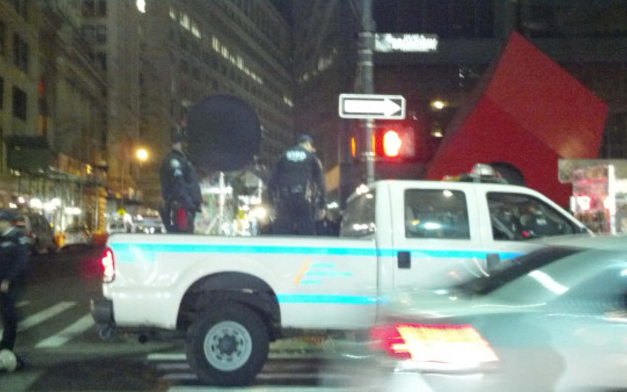 Police moving the alleged LRAD into place