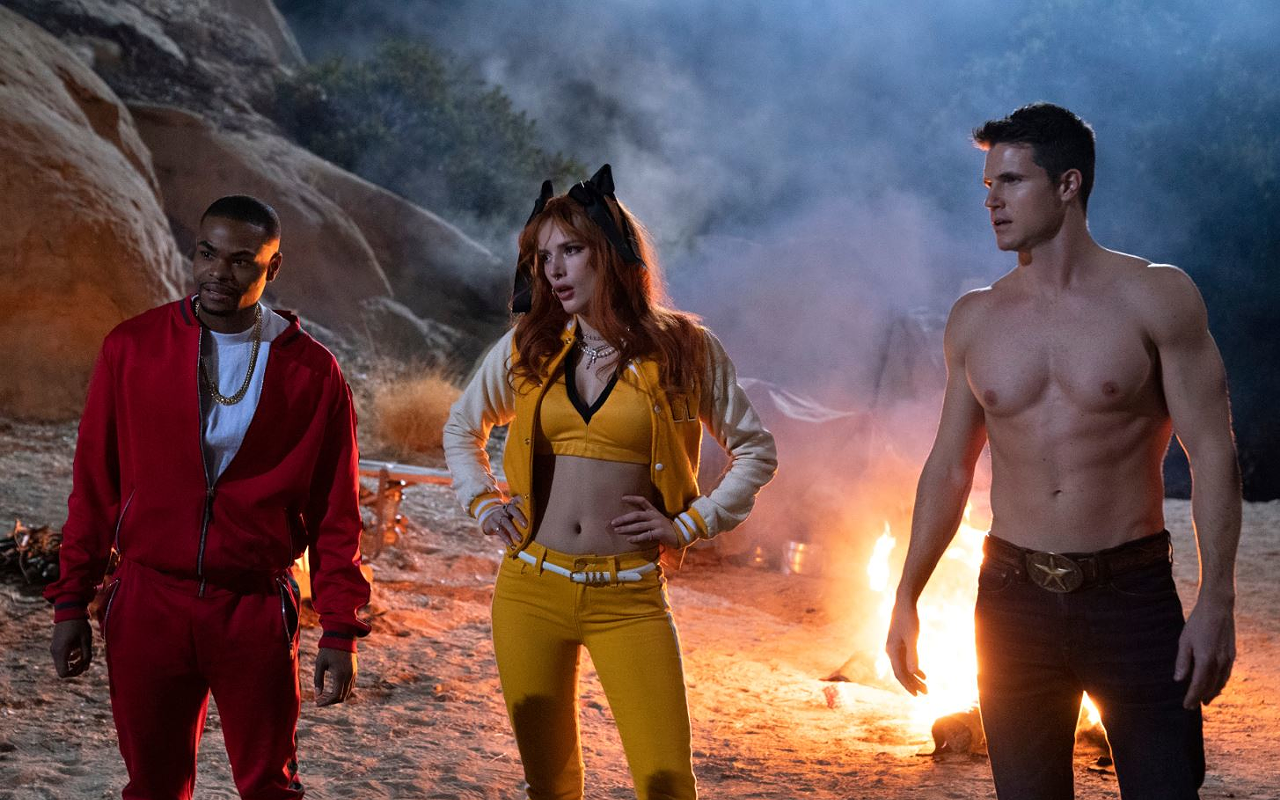 Andrew Bachelor, Bella Thorne and Robbie Amell, from left, return from the dead to get killed again in "The Babysitter: Killer Queen"