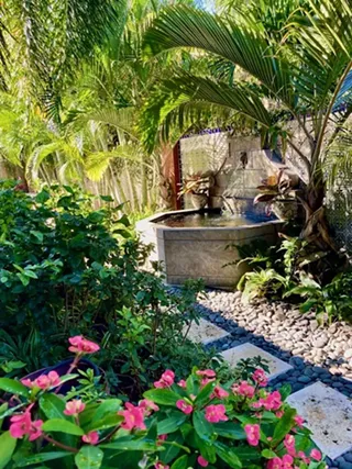 Experience beautiful gardens, artists, live music, and food!