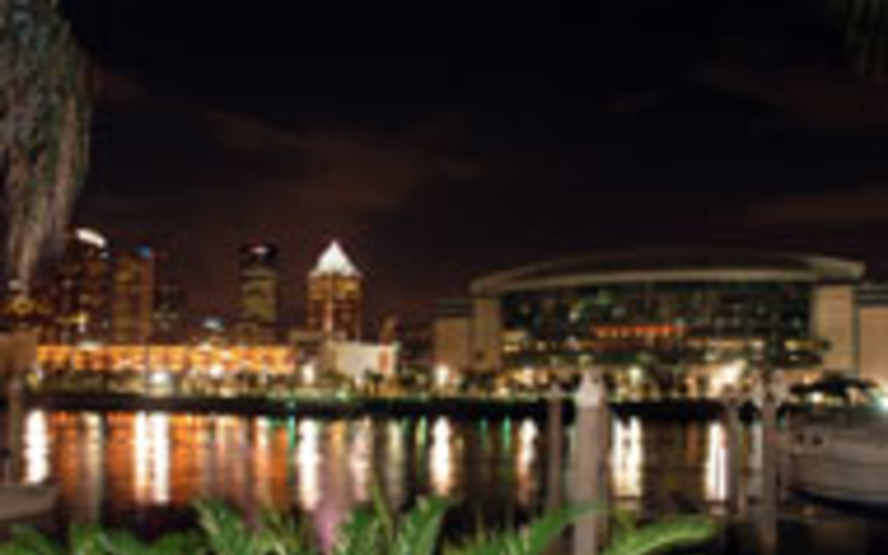A ROOM WITH A VIEW: One of the many sensual 
    pleasures at That's Amore is its stunning view  of 
    downtown Tampa.