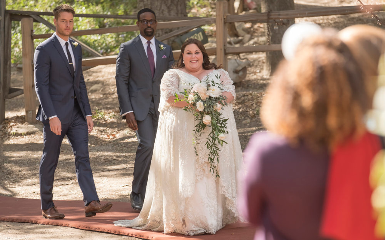 Kate walks down the aisle with her two best men by her side in the This Is Us season two finale.