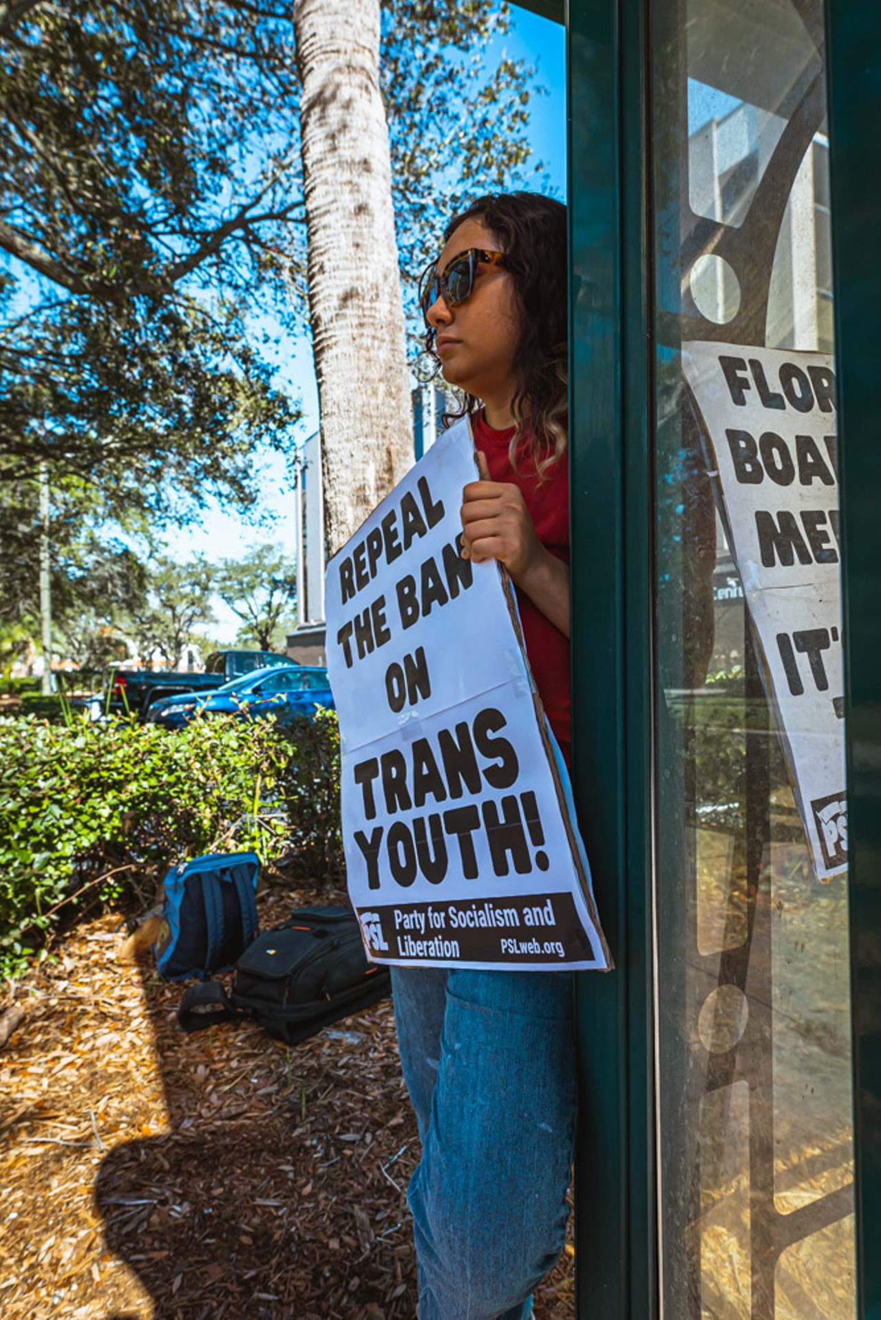 Photos: Activists protest anti-trans legislation outside office of Tampa surgeon Michael Wasylik