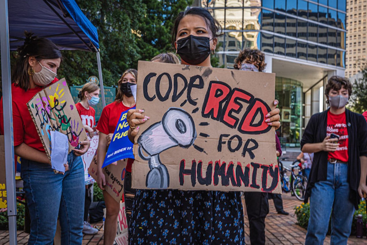 PHOTOS: Climate activists rally at Tampa City Hall to shed light on impending &#145;code red for humanity&#146;