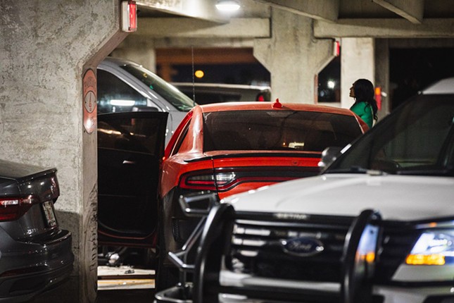 Tampa police investigate a shooting inside a parking garage in Ybor City, Florida on March 23, 2024.