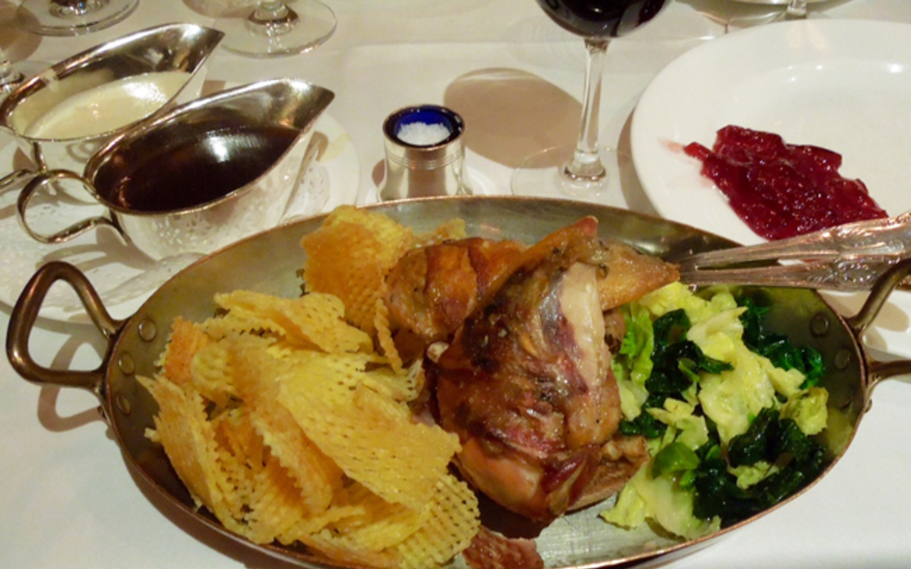 Partridge with fresh-cut waffle crisps and braised savoy cabbage.