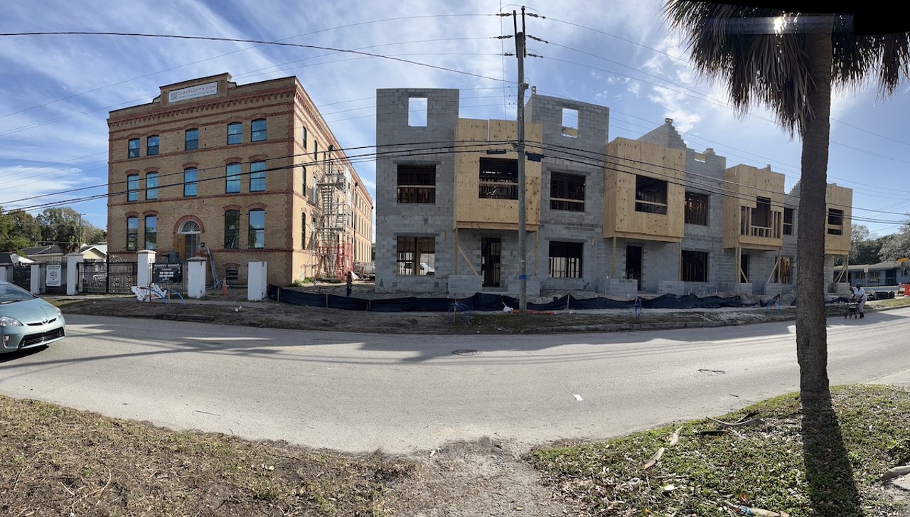 Townhomes under construction next to historic cigar factories in West Tampa.