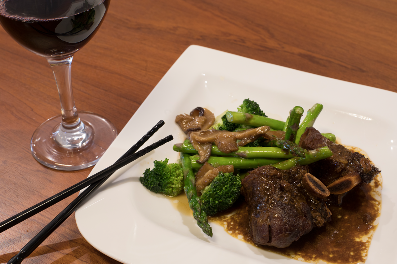 Among the entrees, short ribs feature tender beef falling off the bone and perfect vegetable accompaniments.