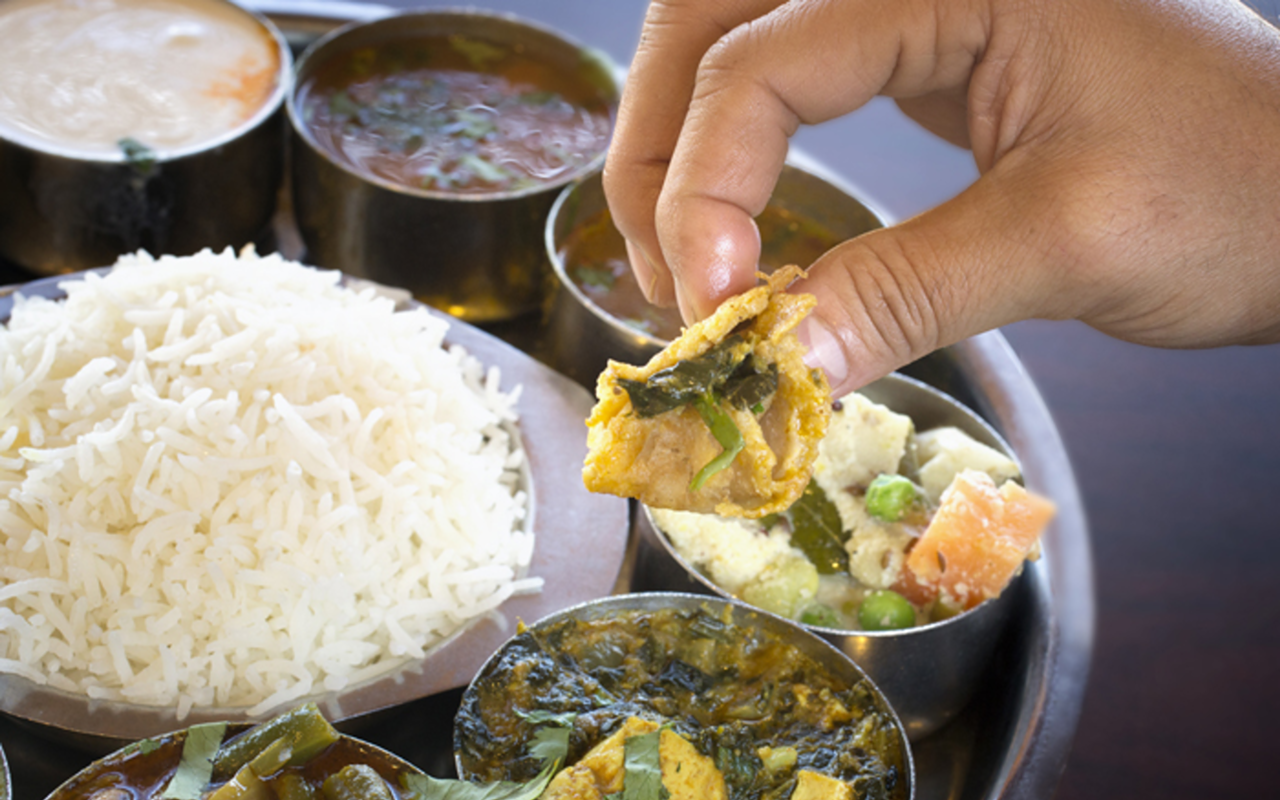 At Udipi, hop from bowl to bowl with the south Indian thali dish's mini buffet.