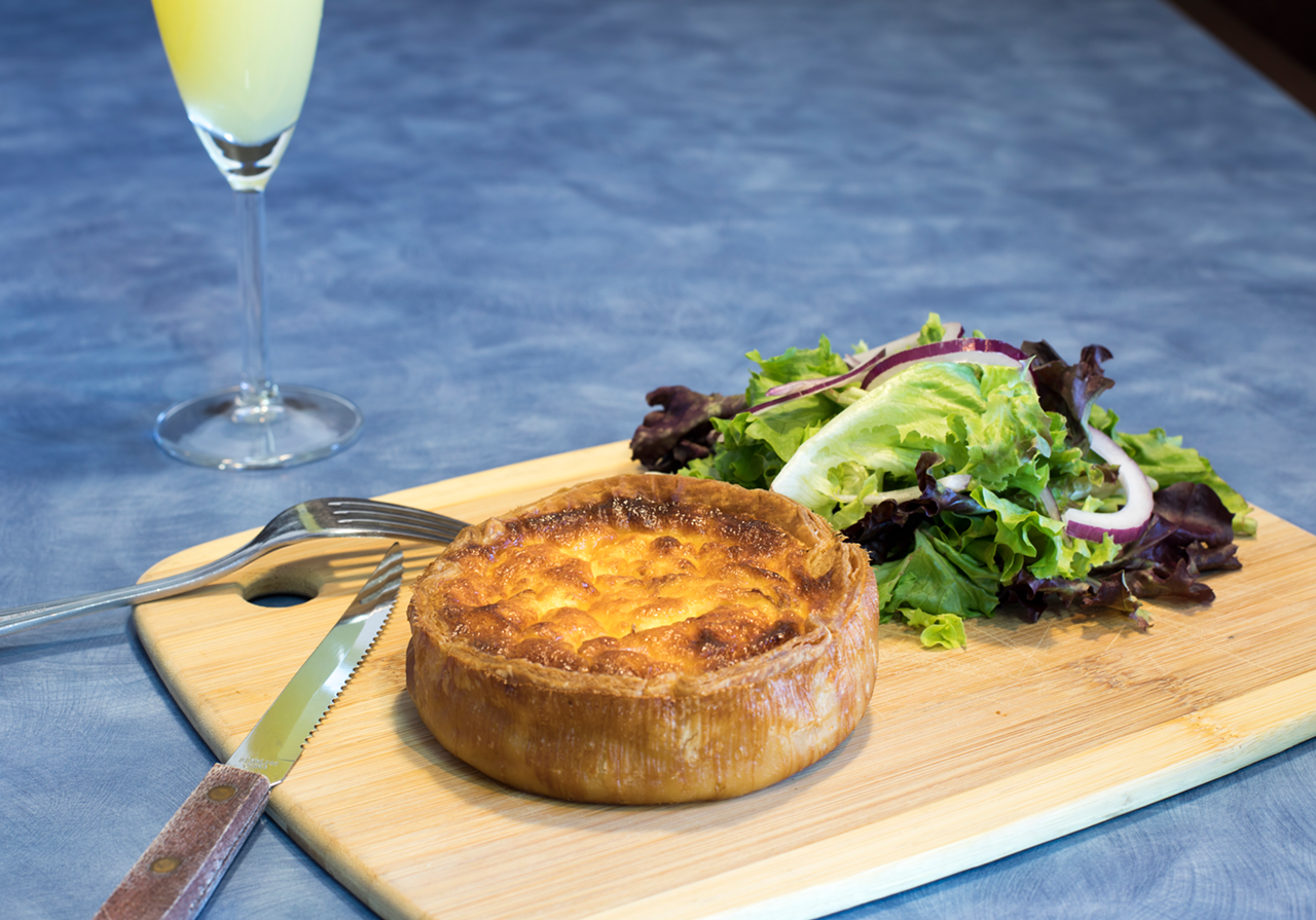 Here, the restaurant's mushroom-goat cheese quiche is textbook.