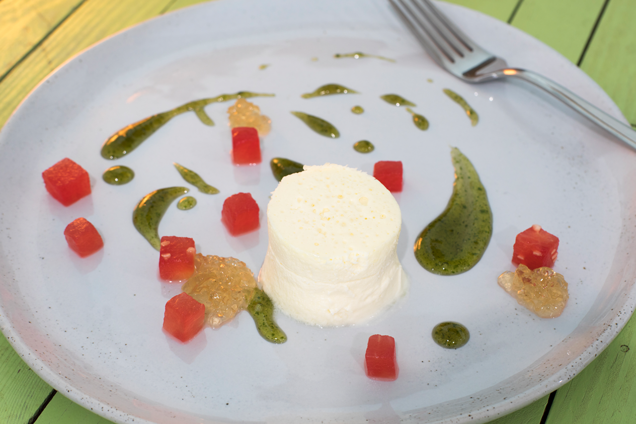 Feta cheesecake with compressed watermelon, swirls of basil syrup and white balsamic gelee. The flavors are a mouthful of joy.
