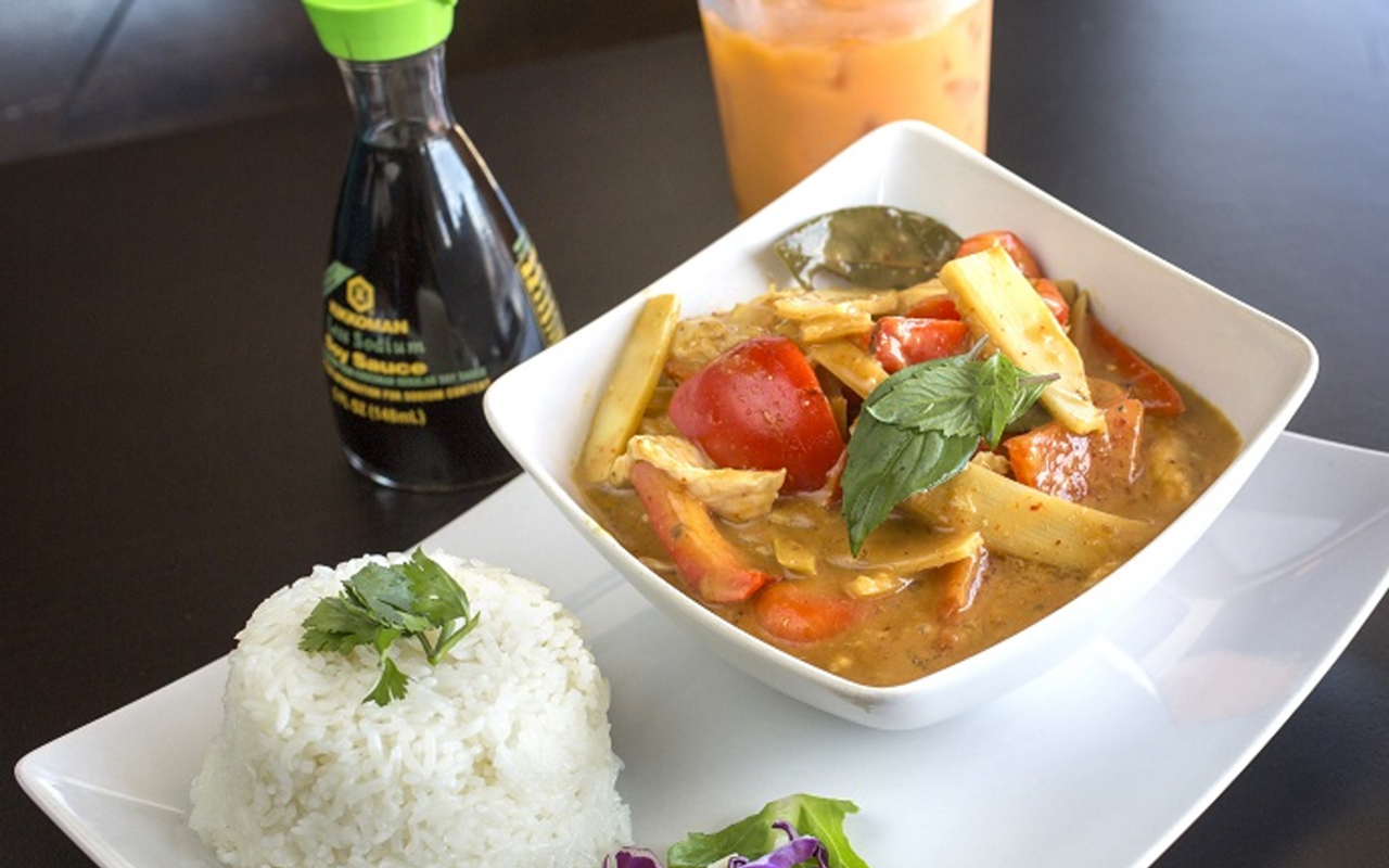 THAI-VIET MIX: Alongside jasmine rice, Sate’s colorful panang curry with chicken, bell pepper and more.