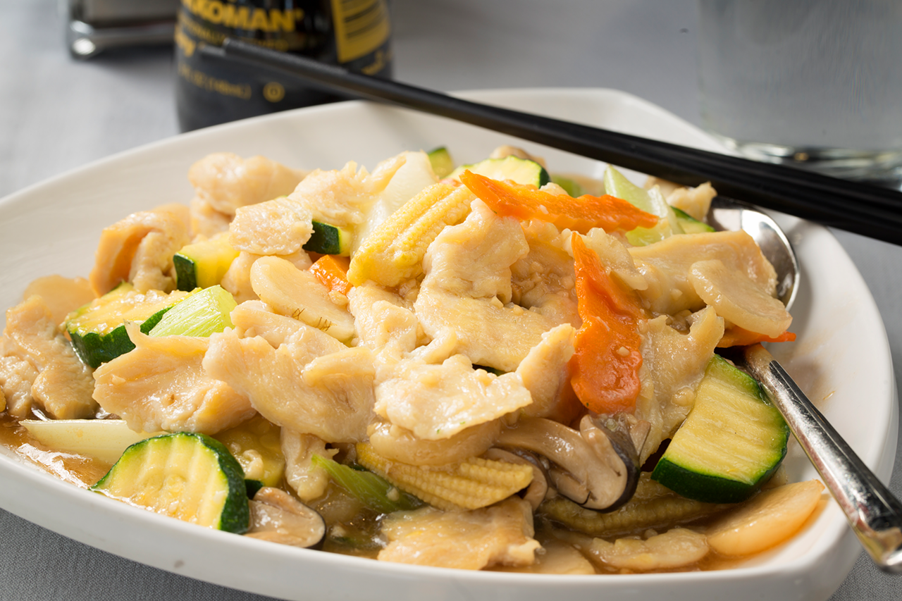 Moist garlic chicken — mixed with zucchini, celery, water chestnuts, mushrooms, baby corn and carrots — is surprisingly subtle.