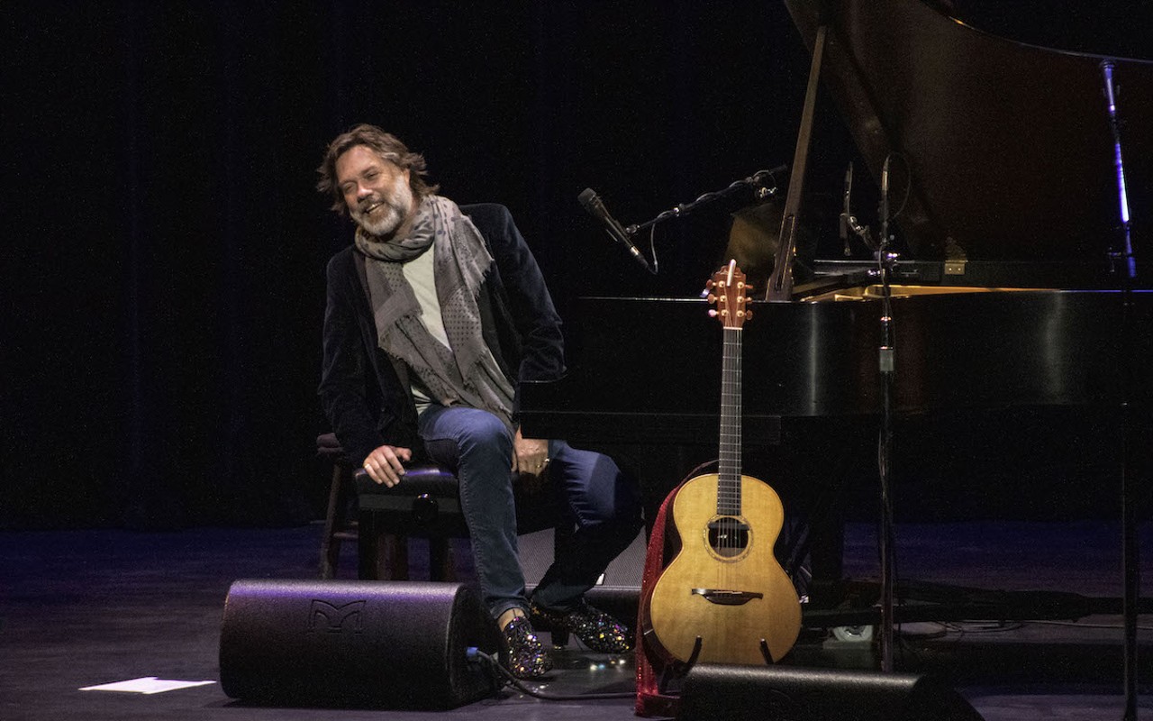 The ever so stylish Rufus Wainwright in Tampa, Florida on Oct. 7, 2022 looking dashing in his velvet blazer, loosely hung scarf and rhinestone encrusted boots.
