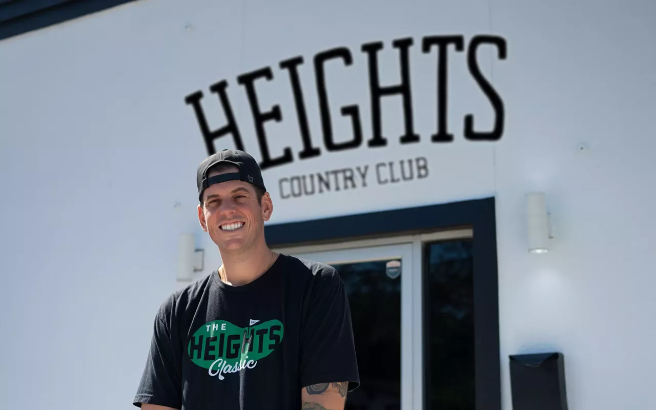 Co-owner Greg Spadaccini standing outside of The Heights Country Club at 5128 N Florida Ave.