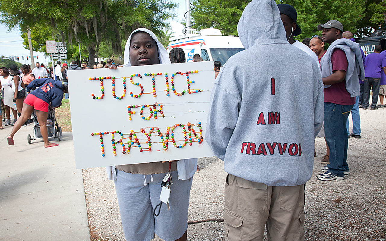 ALL FOR ONE: Protesters in the now-ubiquitous hoodies at a rally March 24 in Tampa’s Al Lopez Park.