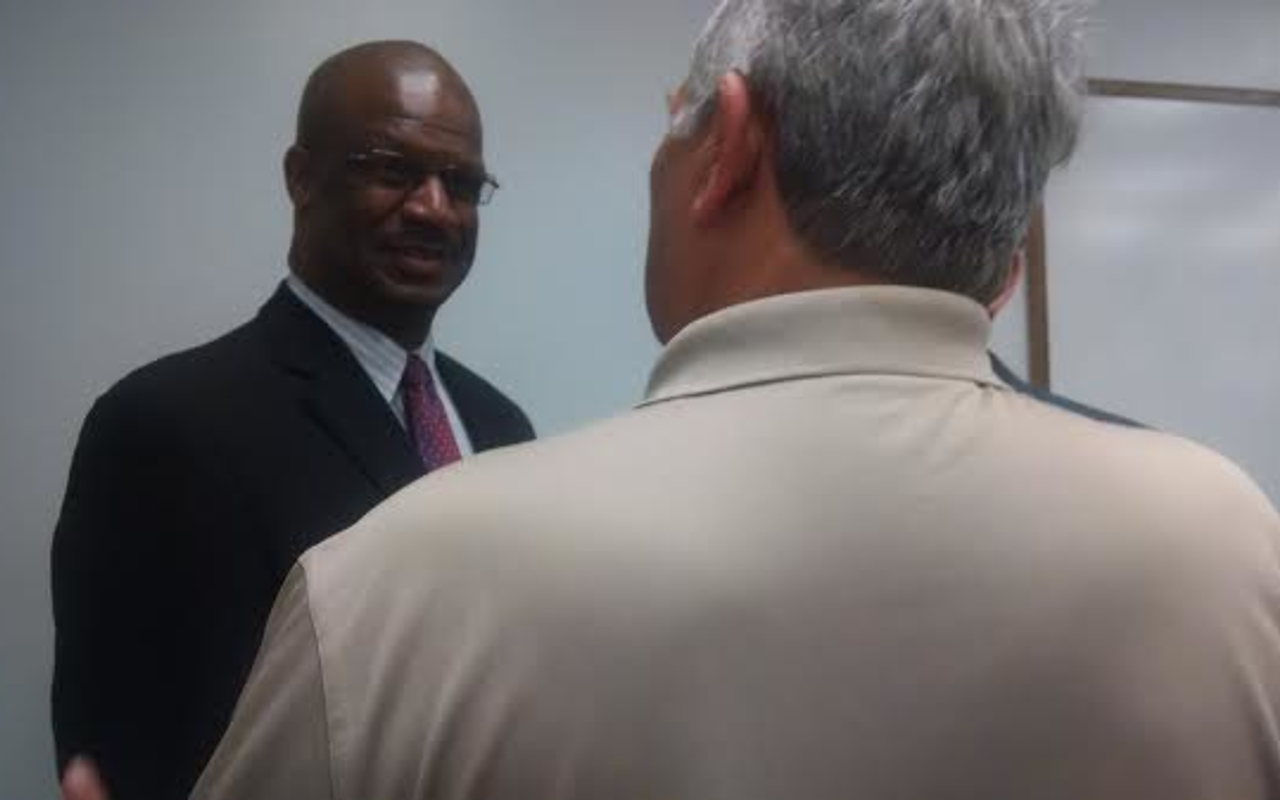 St. Pete Police Chief Tony Holloway meeting City Councilman Bill Dudley as he was officially introduced to the press in July.