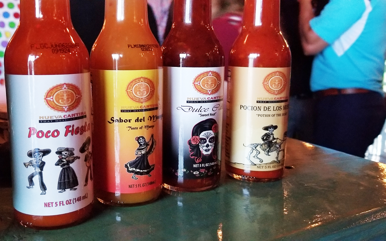 Nueva Cantina's signature line of four house-made hot sauces.