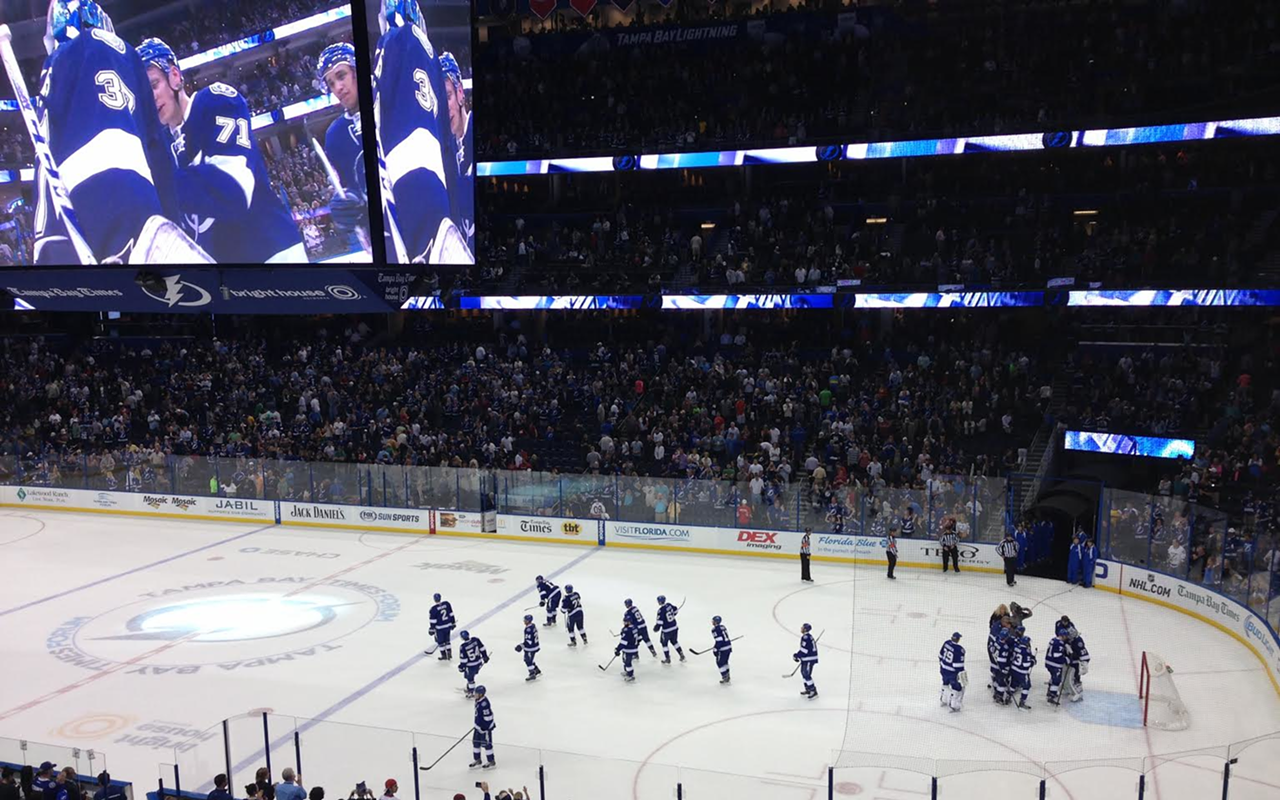 The Lightning congratulate goalie Kristers Gudļevskis after winning the last game of the regular season in a shoot out with the Washington Capitals.