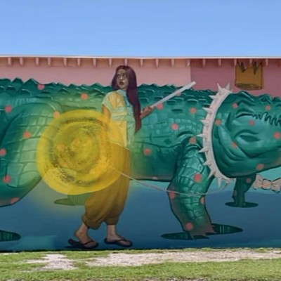 MJ Lindo and Joshua Lawyer’s “After a While” sends a gator walking down Clearwater’s Franklin Street710 Franklin St., ClearwaterMJ Lindo and Joshua Lawyer’s “After a While” is fun to look at when it’s not moving. But view it in augmented reality via ARTours Clearwater app, and suddenly that gator walks and talks.Screenshot of Artours app by Jennifer Ring