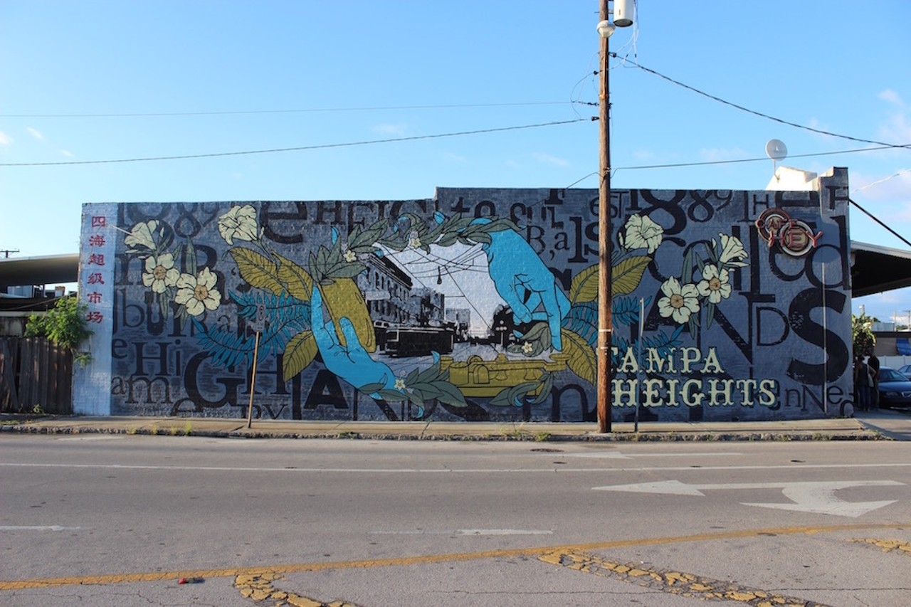 Café Hey mural remembers Tampa Heights’ history
1540 N Franklin St., Tampa
Tony Krol fondly remembers the Tampa Heights mural as the first large-scale mural he completed with Michelle Sawyer in 2015. The mural reflects Tampa Heights' history in the hands of its workers, in its old streetcars, and in the words of Tampa Heights newspaperman William Benton HendersonPhoto via Illsol/Michelle Sawyer