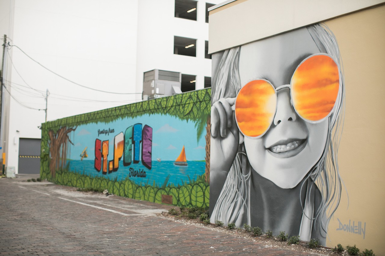 Across the bay, Derek Donnelly welcomes you to St. Pete
330 Beach Dr. NE, St. Petersburg
Derek Donnelly was honored to paint Beach Drive’s first mural, which still stands on the side of Smith & Associates’ Beach Drive Real Estate office.