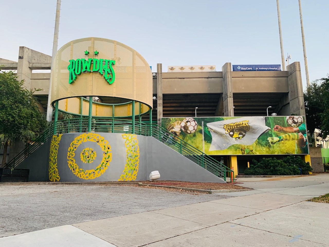 Teamwork makes the mural work
230 1st St. SE, St. Petersburg
One of the coolest things about Tampa-based artist Ya La’ford is how much she includes the community in her work. Take her Rowdies mural for example. The Rowdies’ color palette isn’t exactly the best. Sorry Rowdies fans, but bright yellow and neon green? Yuck. La’ford’s addition of black and silver to the mural was a much-needed improvement. But what we like most about this mural is that it includes the footprints of all the Rowdies players.Photo c/o Ya La'ford