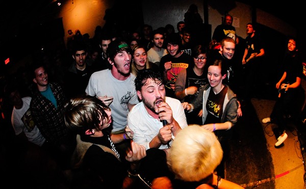 Single Mothers plays Transitions Art Gallery at the Skatepark of Tampa, Florida on Nov.19, 2012.