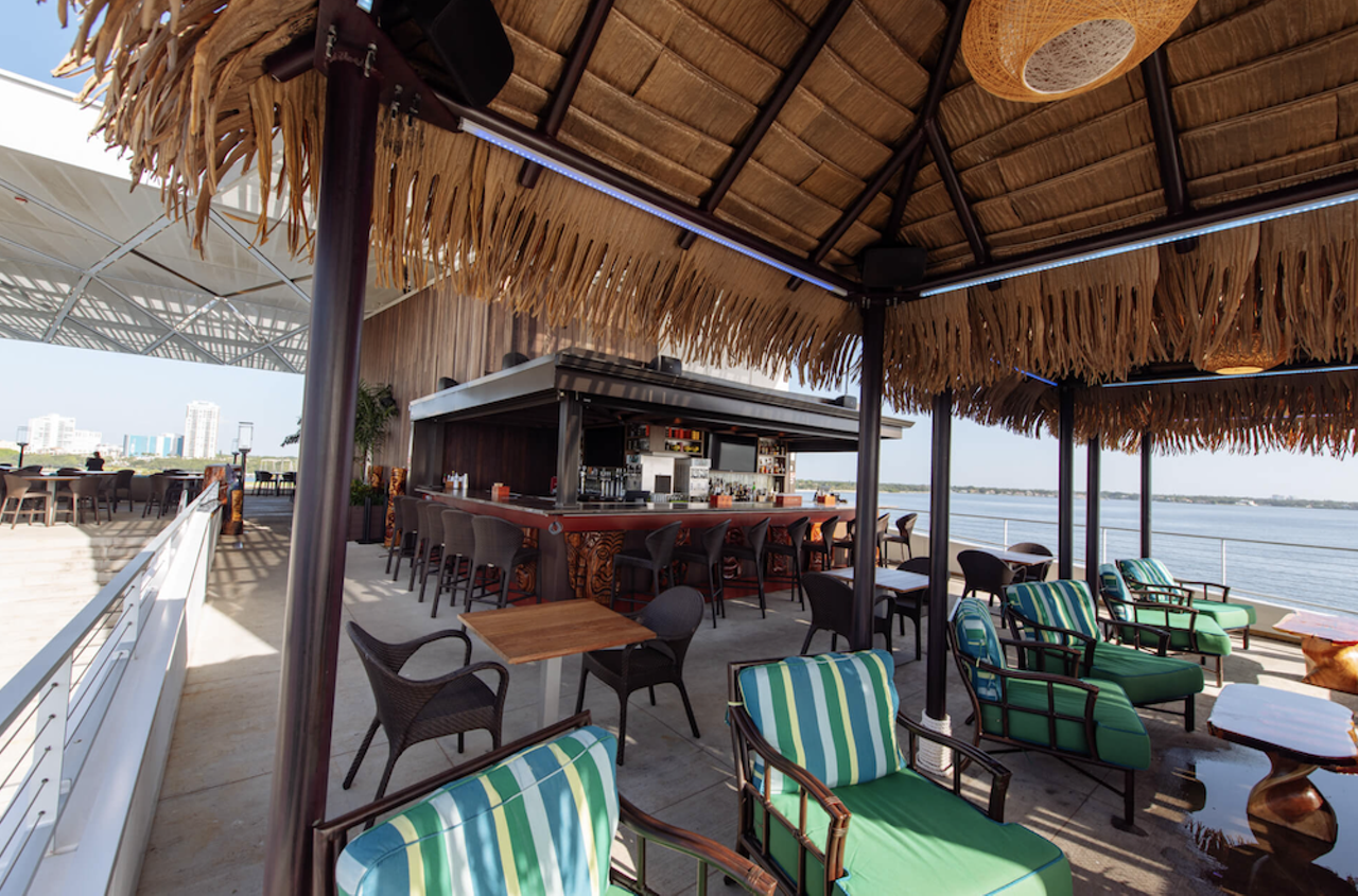 Pier Teaki
800 2nd Ave. NE 5th Floor, St. Petersburg, 727-513-8325
Perched atop the St. Pete Pier, this tiki-themed hangout comes with top-notch views of St. Pete, as well as tostones-filled beach pails and piña coladas. 
Photo via Pier Teaki Website