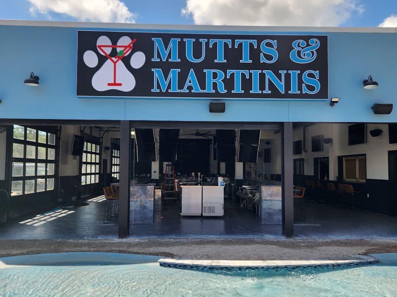 Mutts & Martinis
2900 Central Ave., St. Petersburg, 727-284-6750
Mutts & Martinis, Tampa Bay’s only backyard bar and doggy waterpark, features a variety of “muttgaritas” and “dogtinis.” The concept was announced in 2020 and is the latest from Natalie Corner, who also owns both locations of Love My Dog Resorts. “Human hours” are 2 p.m.- 9 p.m. Wednesday, Thursday and Sunday, noon-midnight on Friday, and 10 a.m.-midnight Saturday. “Dog hours” are until 9 p.m. every night, afterwards no dogs will be allowed on the premises to make way for live music and other late-night entertainment. 
Photo via  Mutts & Martinis/Facebook