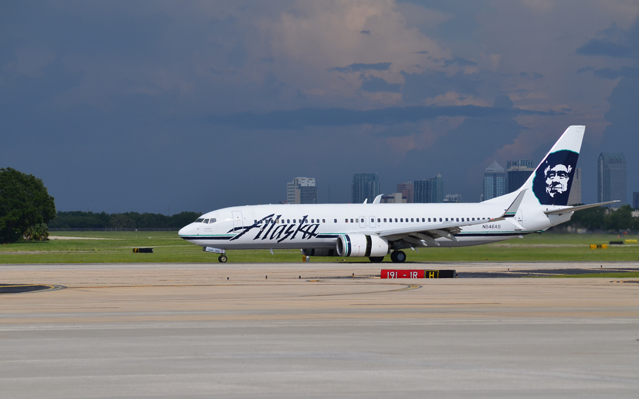 First Alaska Airlines flight from Seattle that landed yesterday in Tampa International Airport. Downtown Tampa can be seen in the background.
