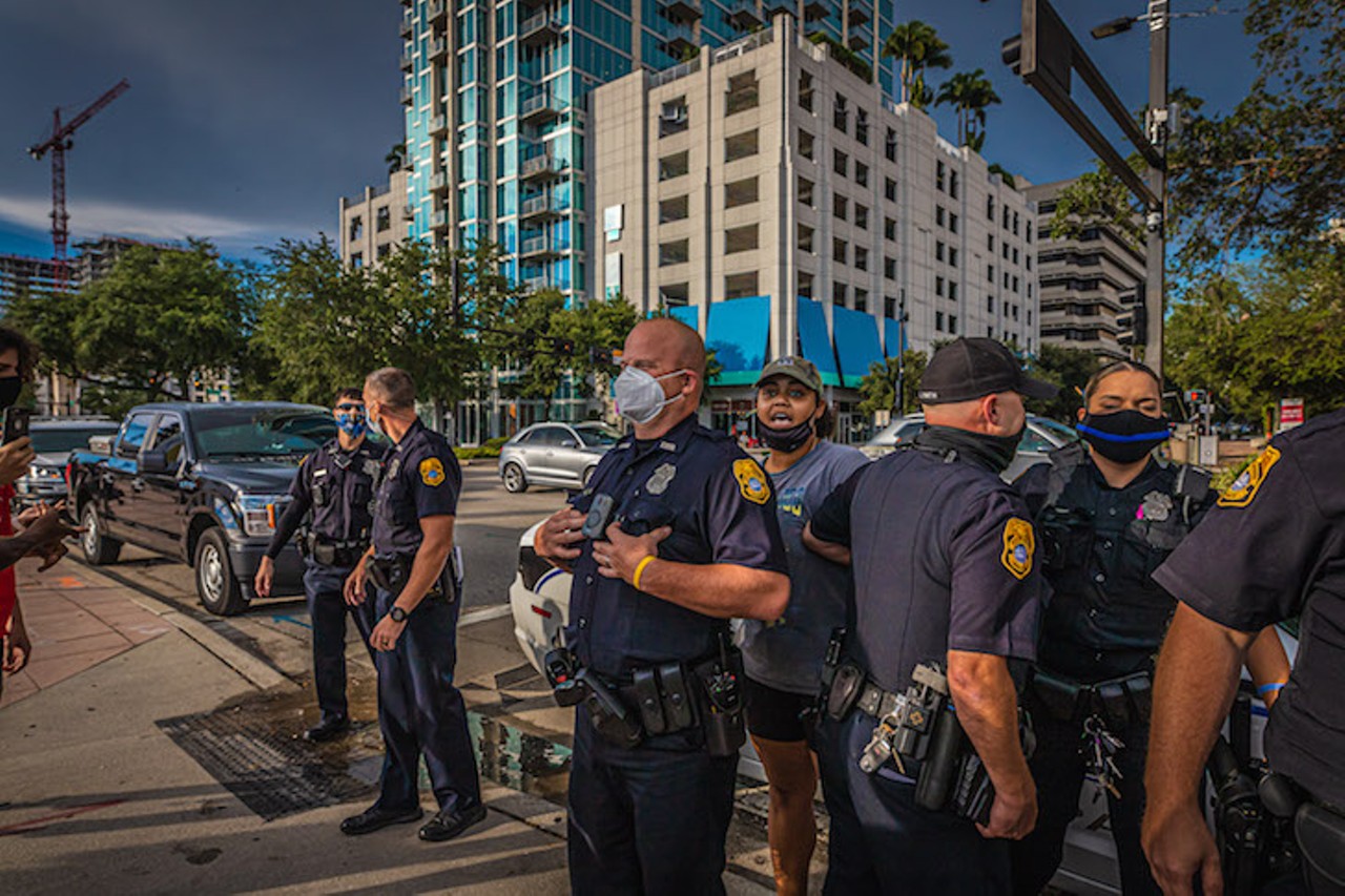 Tampa police charge protesters with criminal mischief, while the &#145;Back the Blue&#146; mural is &#145;under investigation&#146;