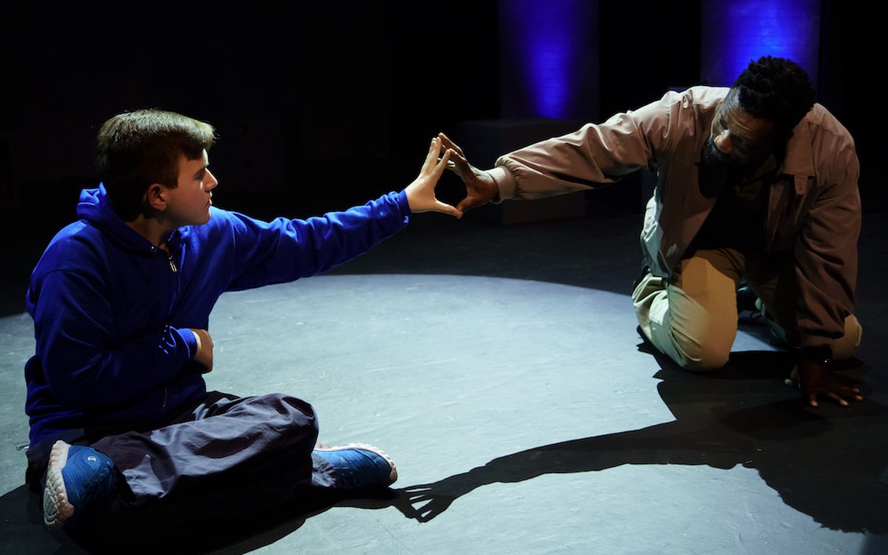 JJ Humphrey (L) and Cranston Cumberbatch in 'The Curious Incident of the Dog in the Night-Time' at Tampa Repertory Theatre in Tampa, Florida.