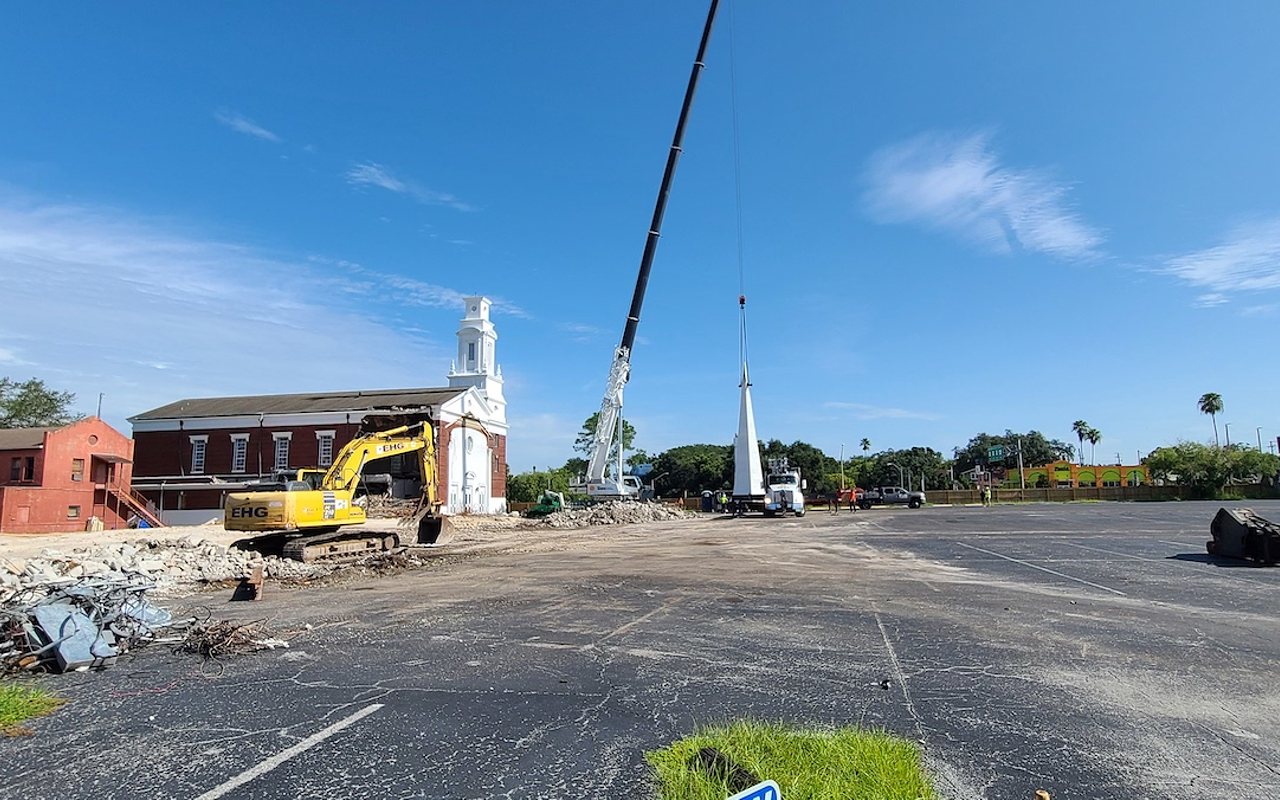 A portion of the steeple from Old Seminole Heights Baptist Church gets loaded onto a truck for relocation on Aug. 6, 2021 in Tampa, Florida.