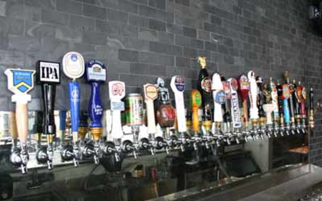 ON TAP AT TAPS: Imported brews dominate the offerings at Taps Wine & Beer Merchants.