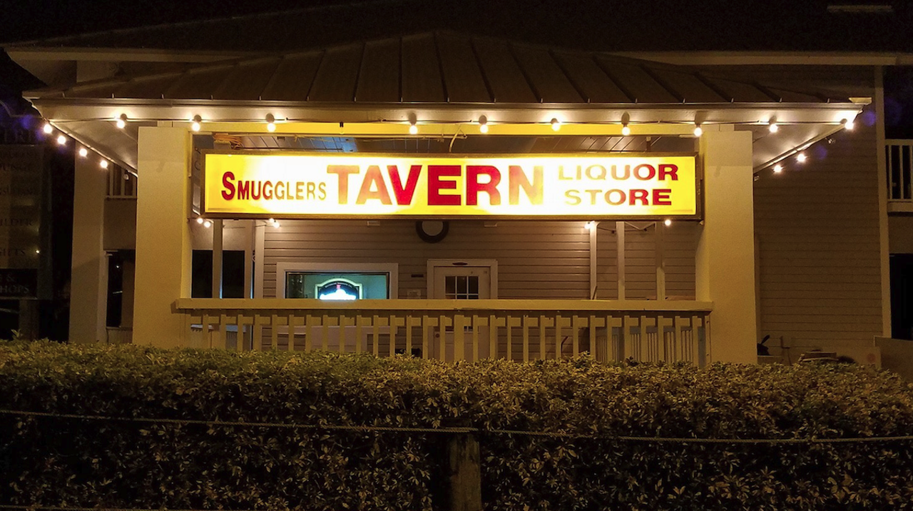 
Smugglers Tavern
1120 Pinellas Bayway S, St. Petersburg 
If you think Tierra Verde is all marinas and seafood restaurants, you’ll be surprised to know there’s at least one true dive bar here, with a to-go package license to boot. Smugglers is another dark and smoky spot that typically caters to locals looking for a lowkey time, but even first timers will be welcomed with a strong pour and friendly, no frills service. 
Photo via Google Maps