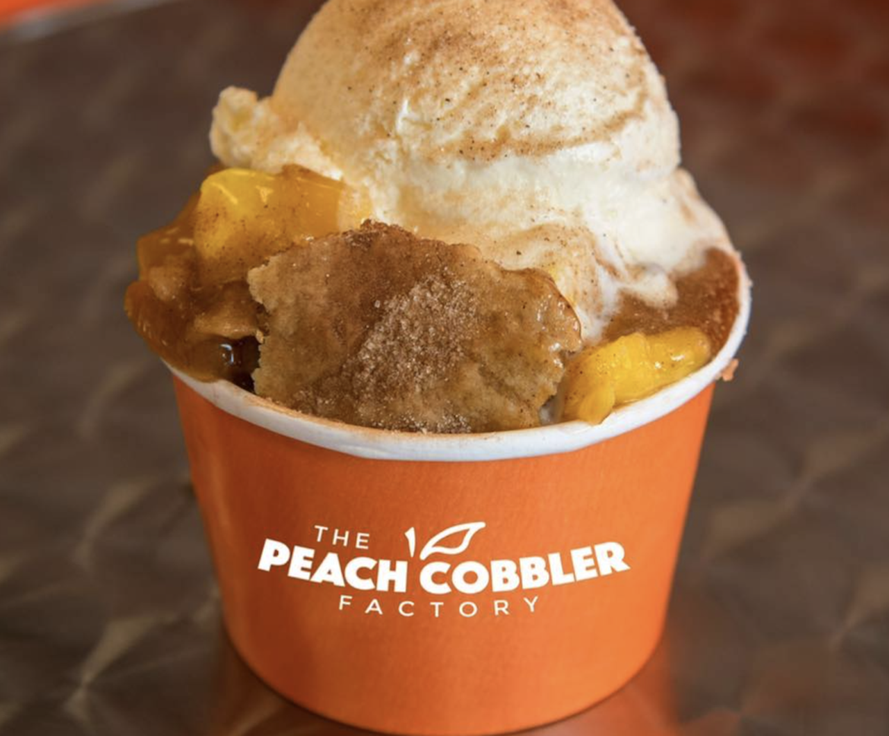 Peach Cobbler Factory
Tampa
Alongside different types of cobbler, the Peach Cobbler Factory—set to open until spring of 2022—will also offer other sweet treats like banana pudding, cinnamon rolls and ice cream. The first Florida location doesn’t have an addressyet, but its Instagram page states that lease negotiations are underway, and that it will update its future patrons with any further details.