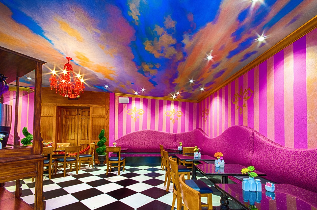 Dough  
2602 S. MacDill Ave., Tampa, 813-902-1979
Dough will have your head in the clouds - literally. The mural ceiling of this colorful doughnut shop shows a bright blue sky with clouds just as fluffy as the doughnuts you came for. Matched with hot pink and orange striped walls and a black and white checkered floor, Dough&#146;s decor is hard to ignore.
Photo via bestdoughnuts.com
