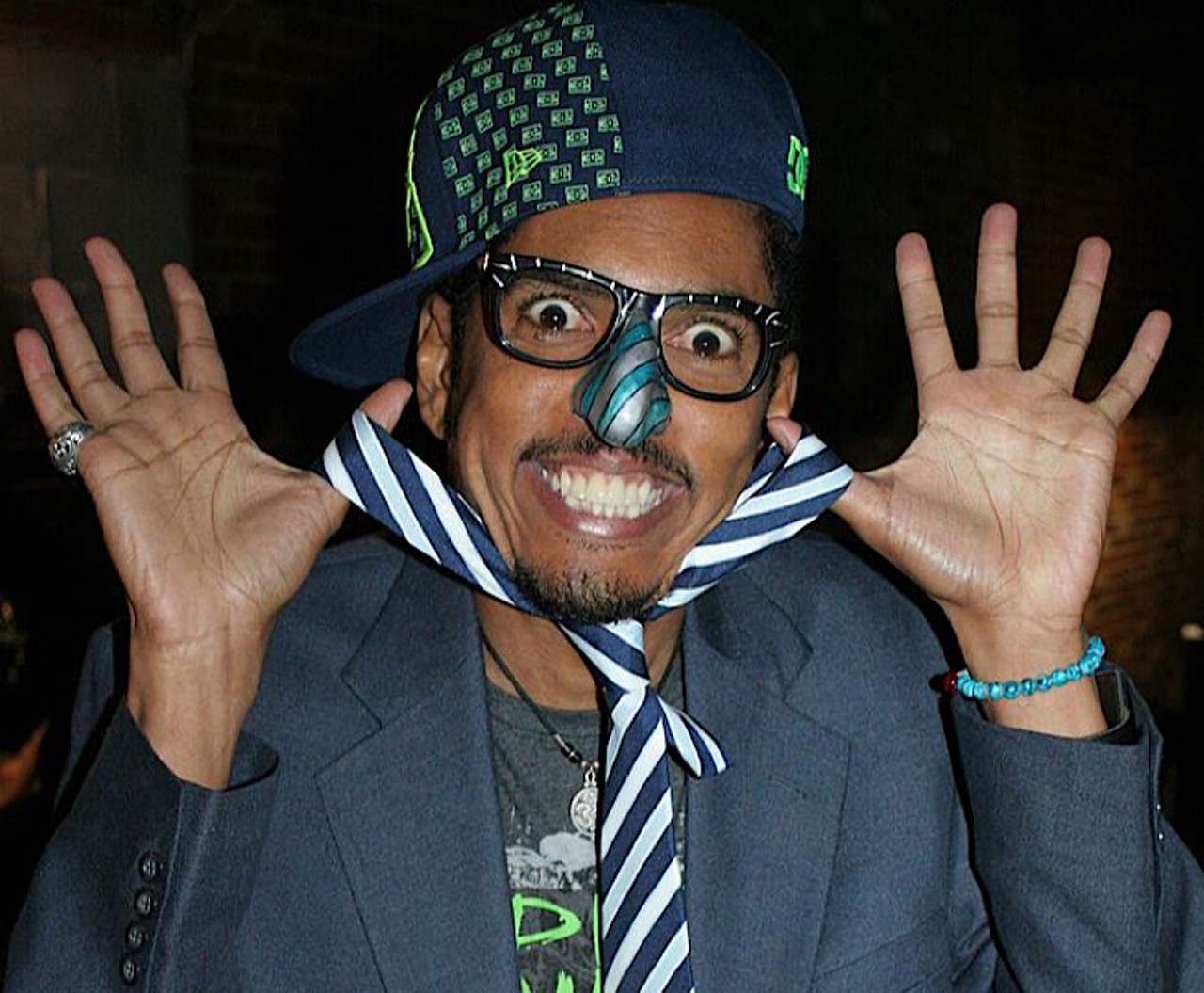 Shock G 
If you ever find yourself around HCC or Chamberlain High, do the humpty dance, because Shock G was a student at both schools. He may have been born in New York City, but he moved to Tampa in middle school. He dropped out of Chamberlain, but he studied music theory at HCC. 
Photo by Gregory E. Jacobs via Wikimedia Commons