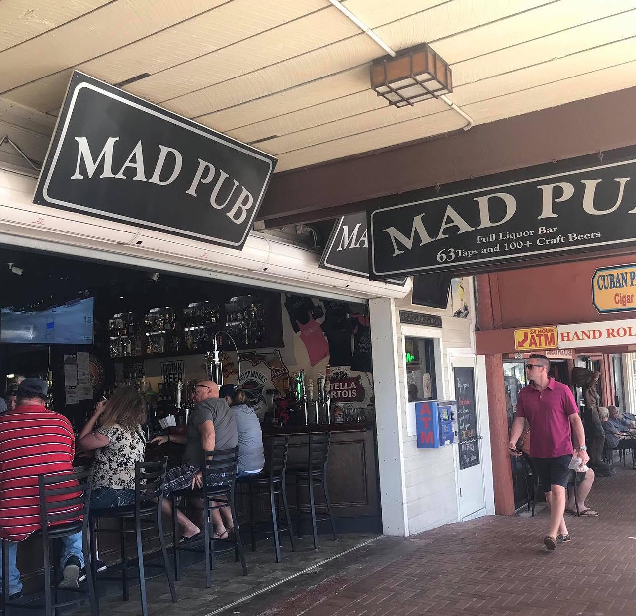 Mad Pub  
12933 Village Blvd, Madeira Beach, FL 33708 ,  (727) 397-7693 
Mad Pub is an open air bar right off the beach, that looks too inviting to pass up after a day in the sun. With a variety of craft beers and a friendly staff, Mad Pub doesn't necessarily have the expected "dive bar" prices, and it doesn&#146;t have the dinghy demeanor or inside smoking like most dives do either. 
Photo via  Mad Pub/Facebook