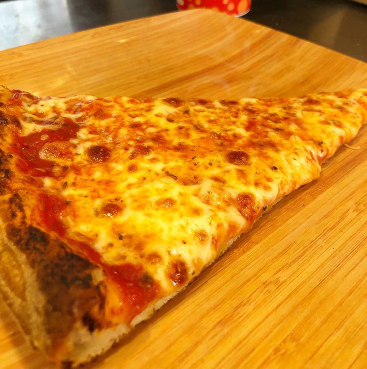 Gino&#146;s NY Style Pizza
727-789-6883. 3394 Tampa Rd., Palm Harbor. ginosnystylepizzeria.com  
Takeout and delivery. Two slices and a drink for $6. Curbside pickup available.
Photo via Gino&#146;s NY Style Pizza/Facebook