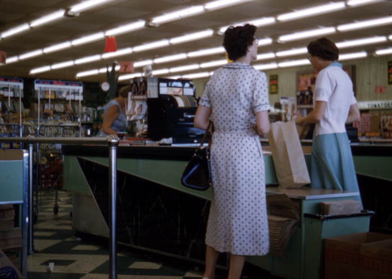 View showing customer at the checkout counter in a Publix supermarket in Sarasota, Florida, 1958.