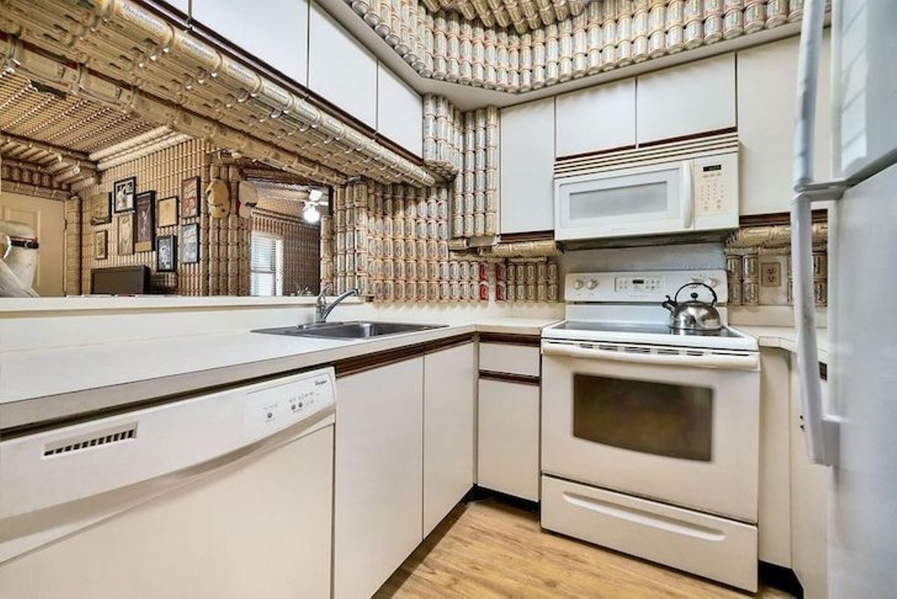This Florida condo is completely covered in empty beer cans, and it can be yours for $100K