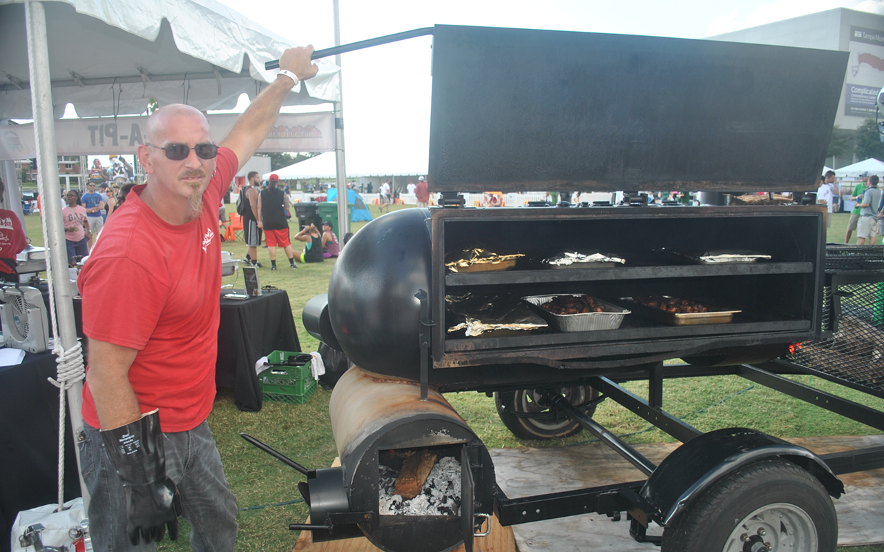 On Saturday, Mike from Port-A-Pit Bar-B-Que smoked hard, and he's only using a "little smoker."