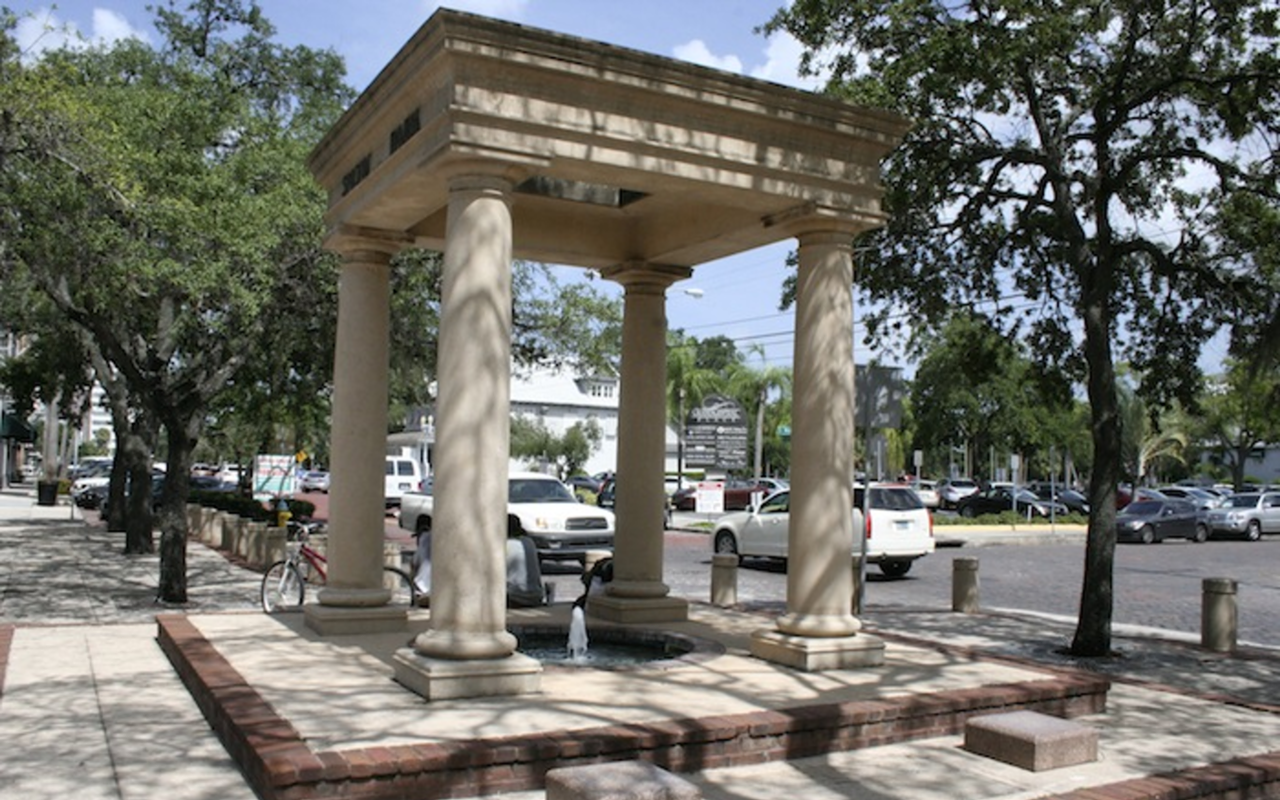 The four columns of Snow Park, the smallest public park in the U.S., serve as a portal to Grand Central Avenue.