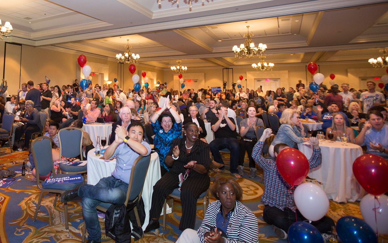 At Tampa's Marriott Waterside Hotel, anxious Democrats watch as returns come in.