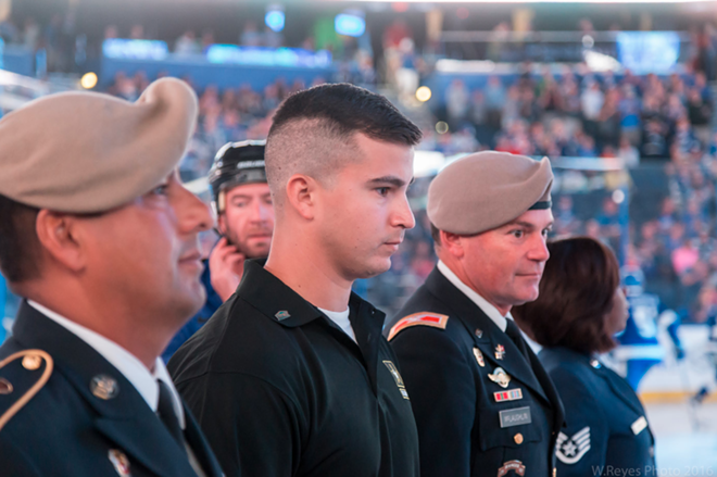 Hayden Lopez (center) readies himself for for an enlistment ceremony at Amalie Arena in Tampa, Florida on October 20, 2016. - W. REYES PHOTO